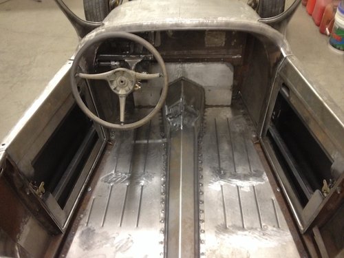  I cut down a 37 Ford steering wheel and welded a smaller diameter rim from a Jeep Cherokee. Complete restoration to follow. 